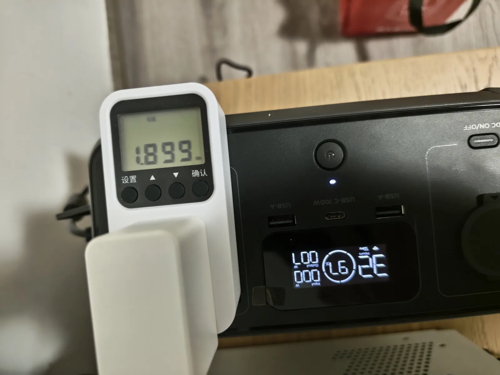 Kill-a-watt style cumulative kWh meter connected to an EcoFlow RIVER 3 during a low-power AC runtime test